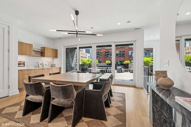226 S Green St Unit 4N, Chicago, IL 60607 - dining room with light wood-style floors, recessed lighting, and a chandelier