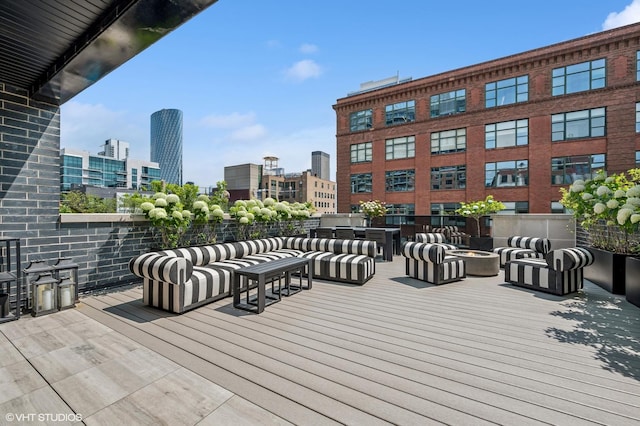226 S Green St Unit 4N, Chicago, IL 60607 - wooden terrace with a city view and an outdoor hangout area