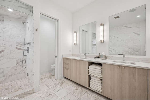 226 S Green St Unit 4N, Chicago, IL 60607 - full bath featuring double vanity, a marble finish shower, marble finish flooring, and recessed lighting