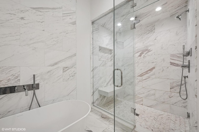 226 S Green St Unit 4N, Chicago, IL 60607 - full bath with a freestanding bath, a shower stall, and marble finish flooring