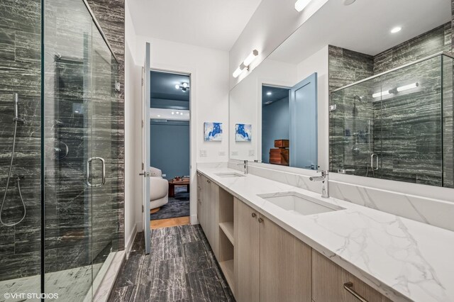 226 S Green St Unit 4N, Chicago, IL 60607 - bathroom featuring double vanity, a shower stall, and ensuite bathroom