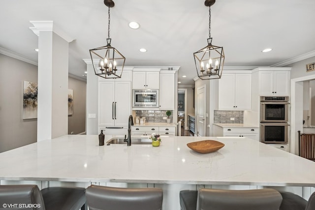 1406 Meadow Ln, Glenview, IL 60025 - kitchen with stainless steel appliances, a chandelier, ornamental molding, recessed lighting, and decorative backsplash