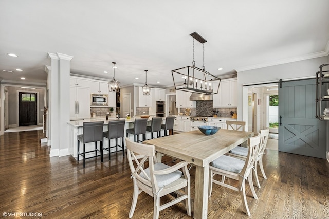 1406 Meadow Ln, Glenview, IL 60025 - dining space with a barn door, ornamental molding, recessed lighting, plenty of natural light, and dark wood finished floors
