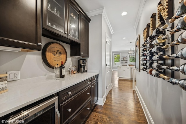 1406 Meadow Ln, Glenview, IL 60025 - indoor dry bar with beverage cooler, crown molding, dark wood-style flooring, and recessed lighting