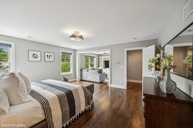 1406 Meadow Ln, Glenview, IL 60025 - bedroom with dark wood-style flooring and baseboards