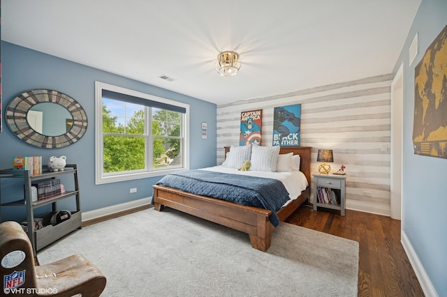 1406 Meadow Ln, Glenview, IL 60025 - bedroom featuring wood finished floors and an accent wall