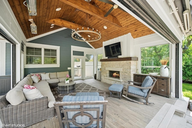 1406 Meadow Ln, Glenview, IL 60025 - living area featuring a wooden ceiling with exposed beams, plenty of natural light, wood finished floors, an outdoor stone fireplace, and high vaulted ceiling