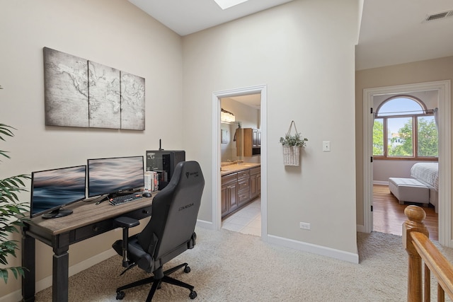 office with light colored carpet