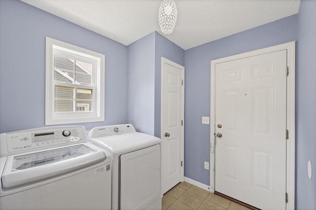 3905 Boulder Ridge Dr, Champaign, IL 61822 - laundry area with washing machine and dryer and light tile patterned flooring