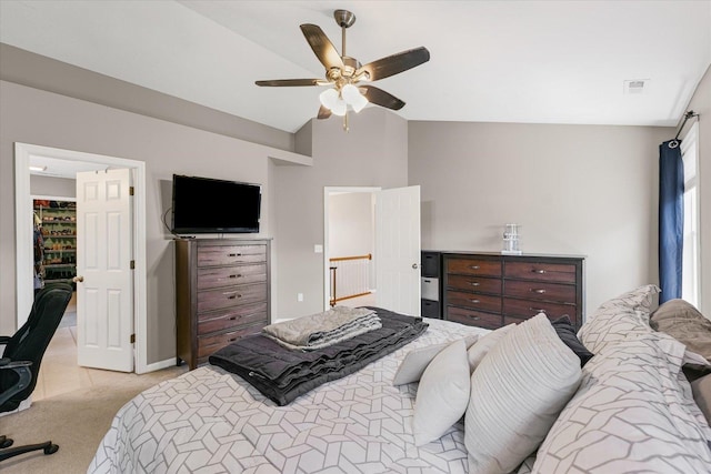 3905 Boulder Ridge Dr, Champaign, IL 61822 - bedroom featuring light carpet, lofted ceiling, a ceiling fan, and a walk in closet