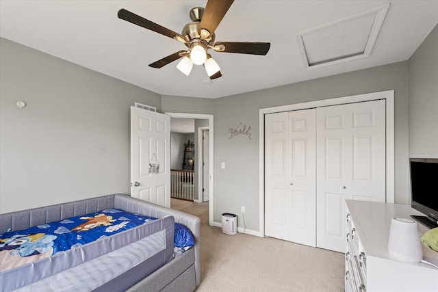 3905 Boulder Ridge Dr, Champaign, IL 61822 - bedroom with light carpet, attic access, a closet, and ceiling fan