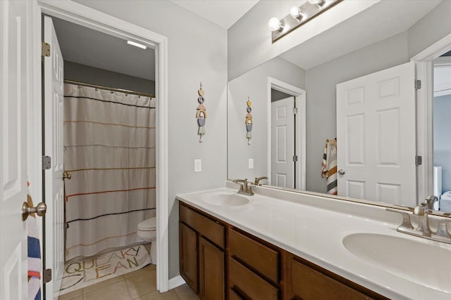 3905 Boulder Ridge Dr, Champaign, IL 61822 - bathroom with double vanity, tile patterned floors, and a shower with curtain