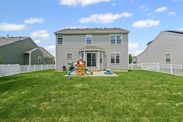 3905 Boulder Ridge Dr, Champaign, IL 61822 - back of house featuring a fenced backyard, a patio, and a playground