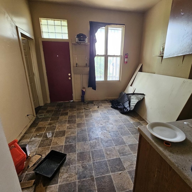 3931 W Lexington St, Chicago, IL 60624 - entryway featuring stone finish flooring and plenty of natural light