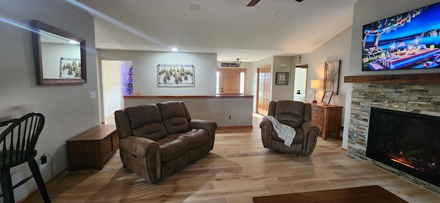 6638 Key Largo Dr, Machesney Park, IL 61103 - living area featuring a stone fireplace, light wood finished floors, ceiling fan, recessed lighting, and baseboards