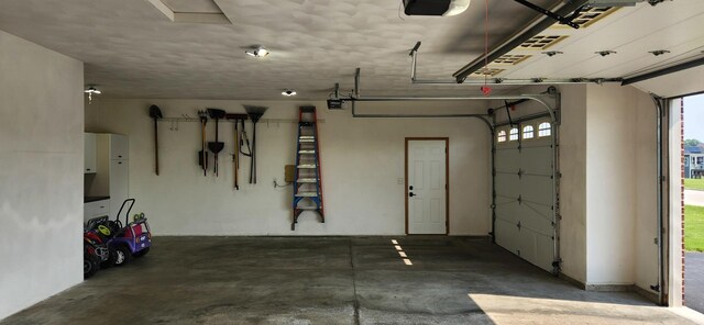 6638 Key Largo Dr, Machesney Park, IL 61103 - garage with a garage door opener