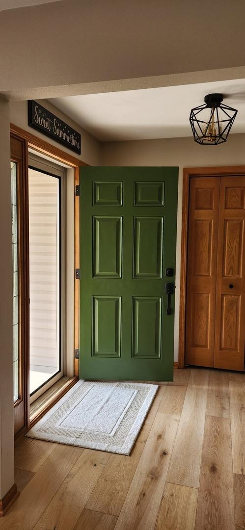 6638 Key Largo Dr, Machesney Park, IL 61103 - entryway with light wood-style floors