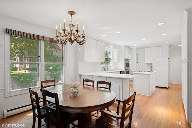 1241 Forest Ave, Wilmette, IL 60091 - dining space with baseboard heating, a chandelier, light wood-type flooring, ornamental molding, and recessed lighting