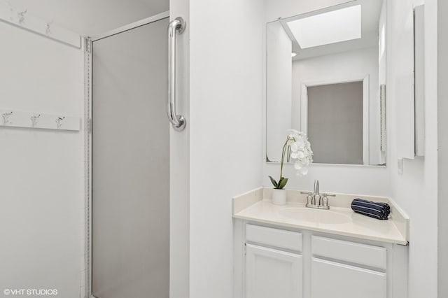 1241 Forest Ave, Wilmette, IL 60091 - full bathroom featuring vanity and a shower with door