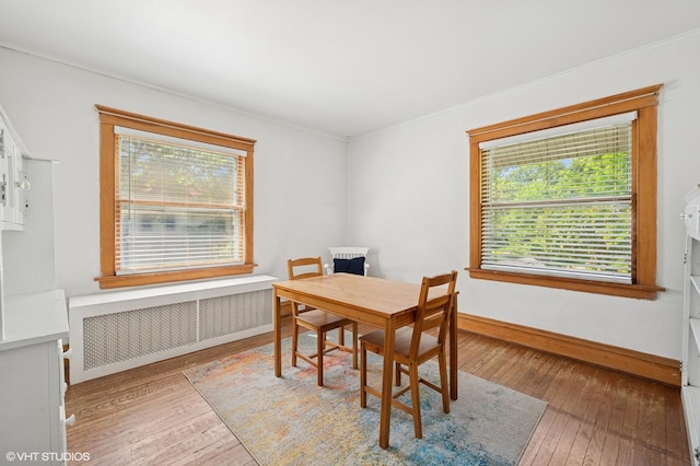 1241 Forest Ave, Wilmette, IL 60091 - dining area featuring radiator and hardwood / wood-style flooring