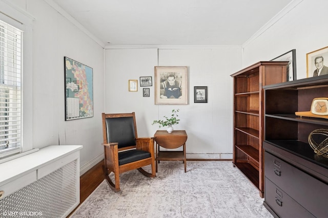 1241 Forest Ave, Wilmette, IL 60091 - sitting room with radiator, ornamental molding, and light wood-style floors