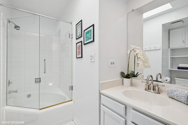 1241 Forest Ave, Wilmette, IL 60091 - bathroom with vanity and enclosed tub / shower combo
