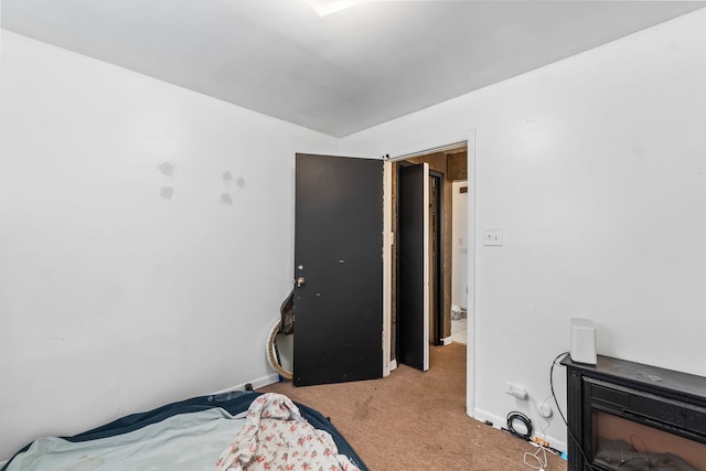 14217 Turner Ave, Robbins, IL 60472 - bedroom featuring carpet flooring, baseboards, and a fireplace