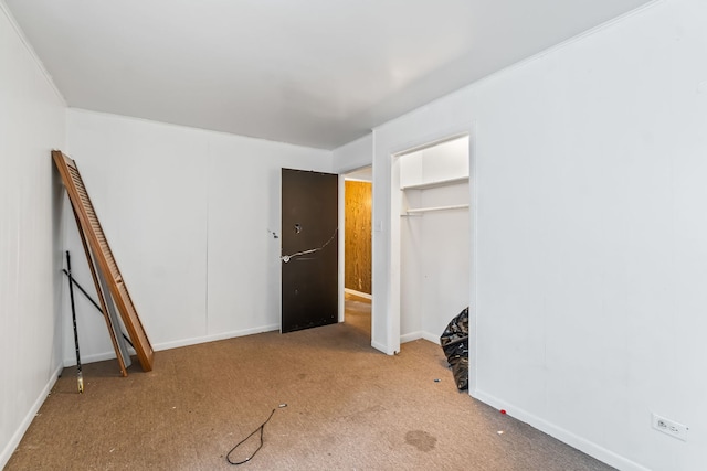 14217 Turner Ave, Robbins, IL 60472 - unfurnished bedroom featuring carpet floors, baseboards, and a closet
