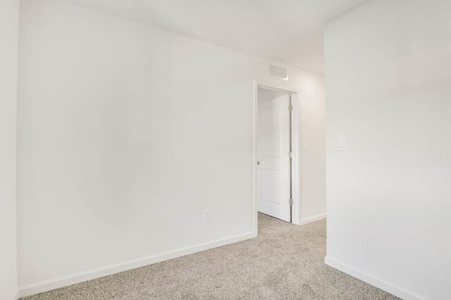 879 Briar Glen Ct, Hampshire, IL 60140 - unfurnished room featuring light carpet and baseboards