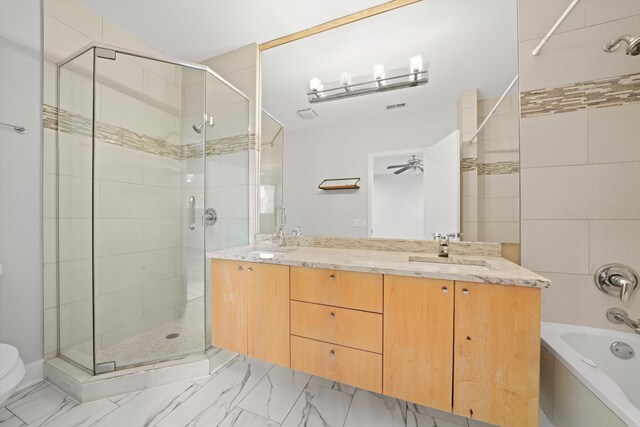 1550 N Leavitt St Unit 1550, Chicago, IL 60622 - full bath with a stall shower, a garden tub, double vanity, marble finish floors, and a ceiling fan