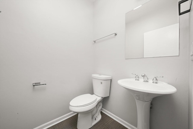 1550 N Leavitt St Unit 1550, Chicago, IL 60622 - bathroom featuring baseboards and toilet