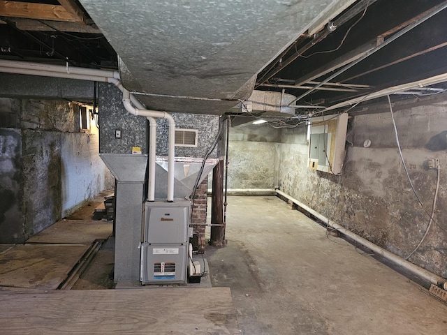 310 Hill Ave, Elgin, IL 60120 - unfinished below grade area featuring electric panel and heating unit