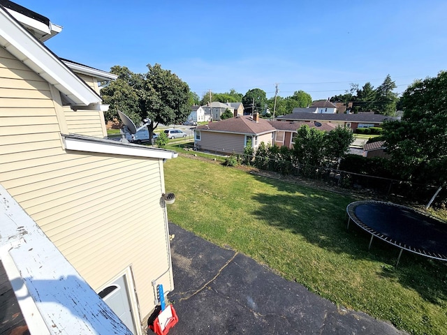 310 Hill Ave, Elgin, IL 60120 - view of yard with a trampoline and a residential view
