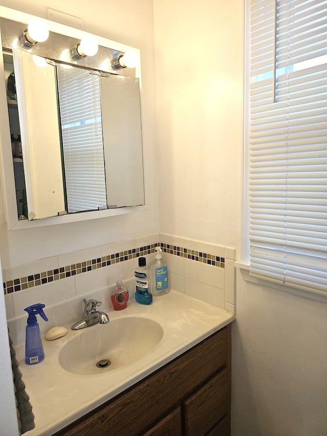 310 Hill Ave, Elgin, IL 60120 - bathroom featuring vanity and backsplash