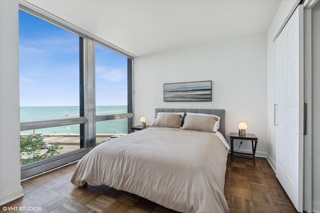 880 N Lake Shore Dr Unit 4E, Chicago, IL 60611 - bedroom featuring a water view and floor to ceiling windows
