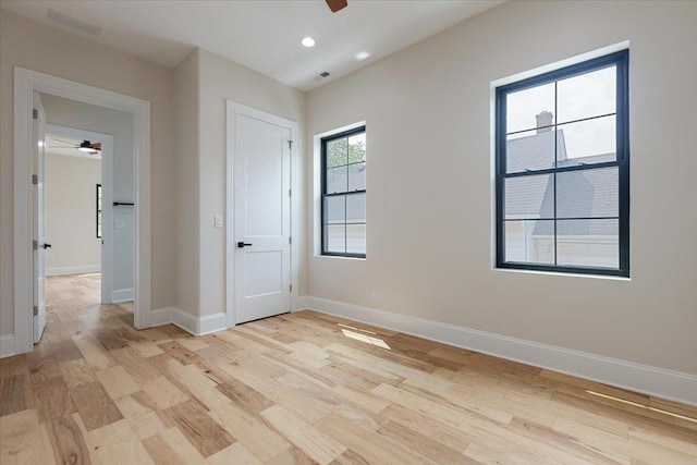 223 Center St, Naperville, IL 60540 - unfurnished bedroom featuring baseboards, light wood-style flooring, and recessed lighting