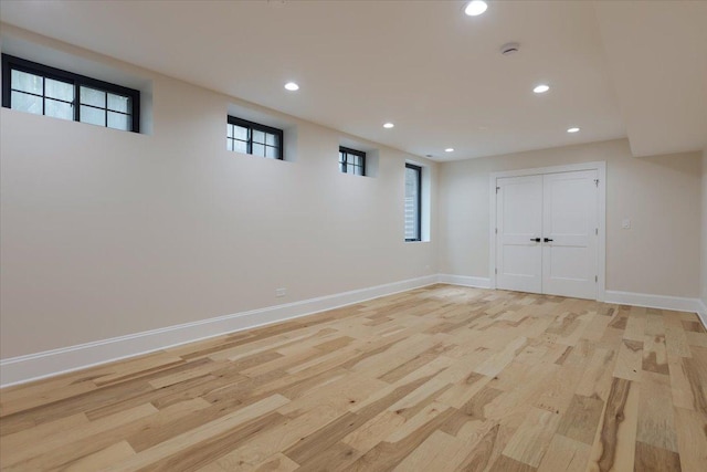 223 Center St, Naperville, IL 60540 - below grade area featuring recessed lighting, light wood finished floors, and baseboards