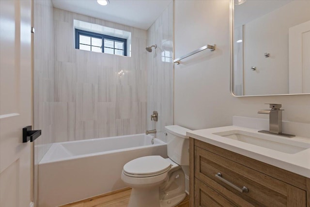 223 Center St, Naperville, IL 60540 - full bathroom with vanity, toilet, shower / bath combination, and wood finished floors