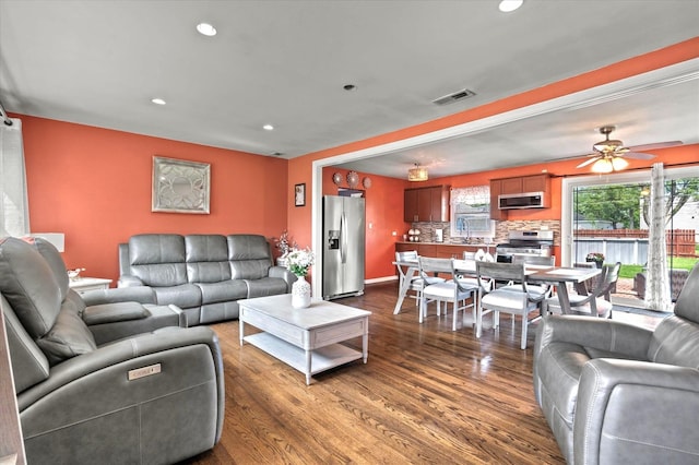 7937 S Lotus Ave, Burbank, IL 60459 - living area with dark wood-style flooring, recessed lighting, and ceiling fan