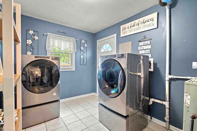 7937 S Lotus Ave, Burbank, IL 60459 - washroom with washing machine and dryer, baseboards, and tile patterned floors