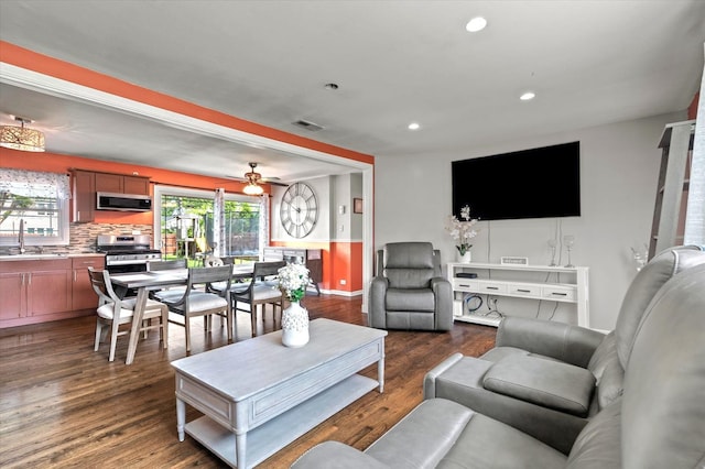 7937 S Lotus Ave, Burbank, IL 60459 - living area with dark wood-style flooring, recessed lighting, a ceiling fan, and baseboards