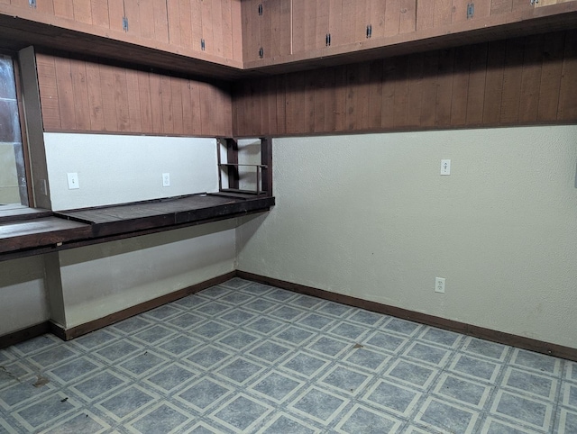 314 W Chestnut, Freeport, IL 61032 - interior space with baseboards and tile patterned floors