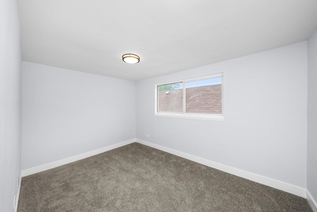 6742 S Honore St, Chicago, IL 60636 - empty room with dark carpet