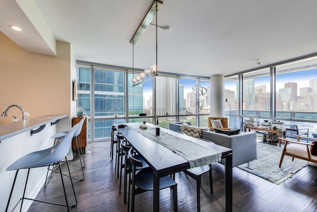 1211 S Prairie Ave Unit 1106, Chicago, IL 60605 - dining area featuring a skyline view, dark wood-type flooring, expansive windows, and a chandelier