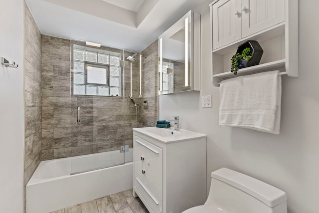 4730 N Hermitage Ave Unit 3C, Chicago, IL 60640 - full bath featuring vanity, bath / shower combo with glass door, and wood finished floors