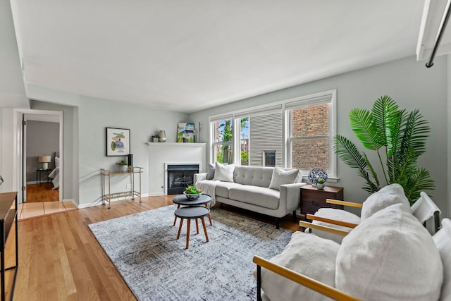 4730 N Hermitage Ave Unit 3C, Chicago, IL 60640 - living area with a fireplace and wood finished floors