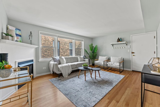 4730 N Hermitage Ave Unit 3C, Chicago, IL 60640 - living room featuring baseboards and wood finished floors