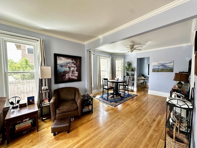 478 Barrett St, Elgin, IL 60120 - living room with light wood-style floors, baseboards, crown molding, and a ceiling fan