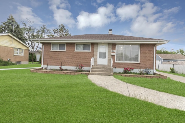 1205 N Irving Ave, Berkeley, IL 60163 - bungalow-style house with entry steps, brick siding, and a chimney