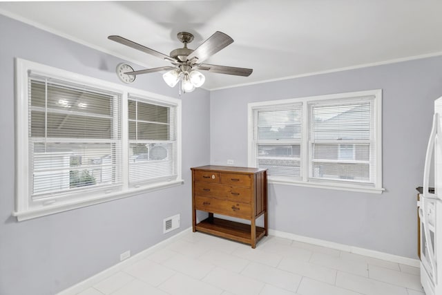 1205 N Irving Ave, Berkeley, IL 60163 - unfurnished room featuring ceiling fan, baseboards, and ornamental molding